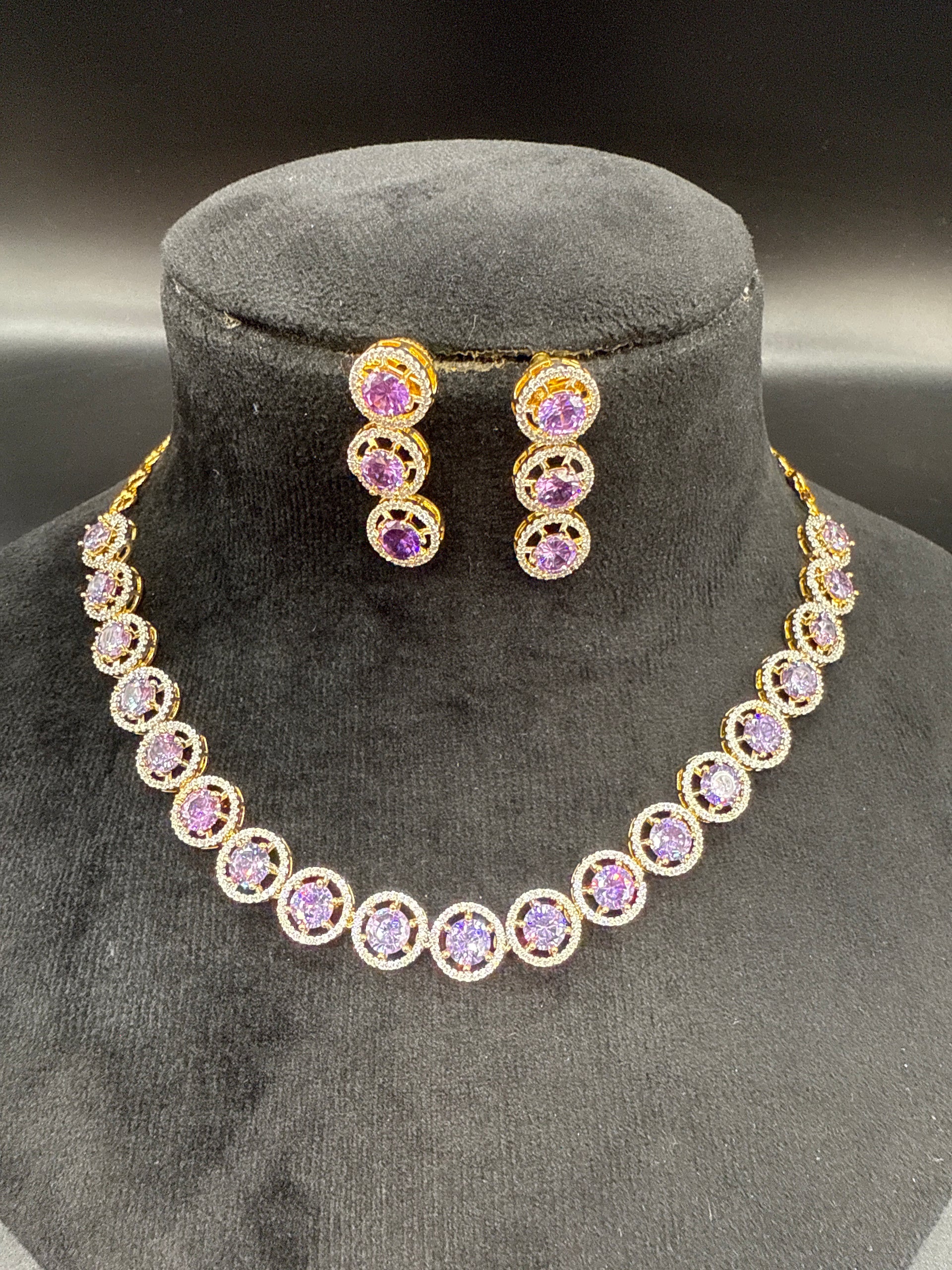 AD necklace set with purple stones