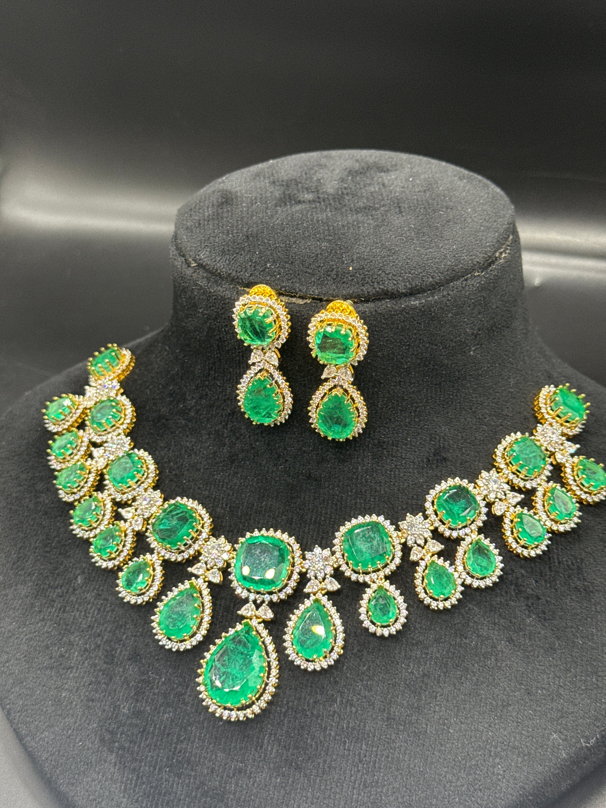 Double let emerald set