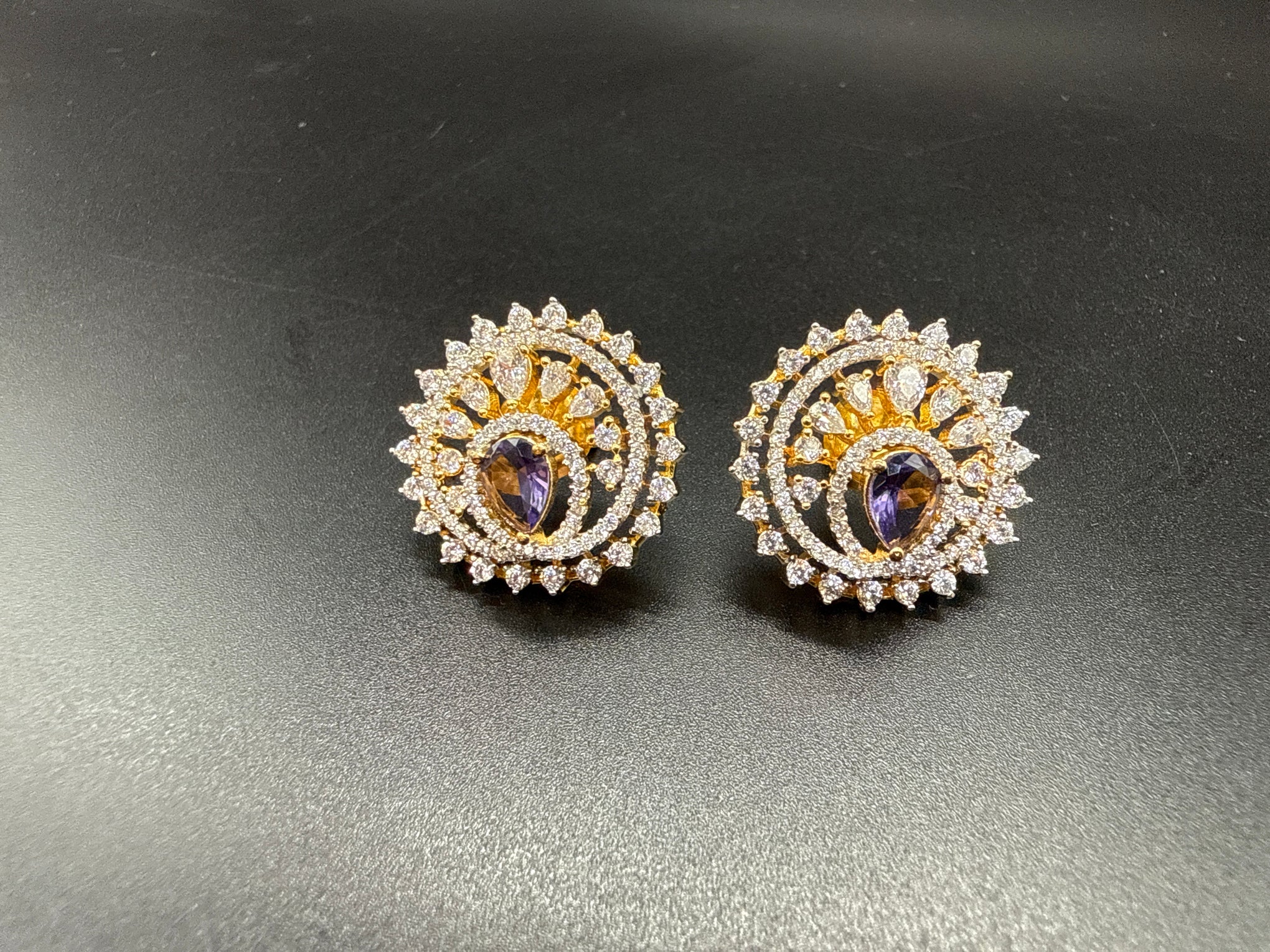 Purple stone AD studs