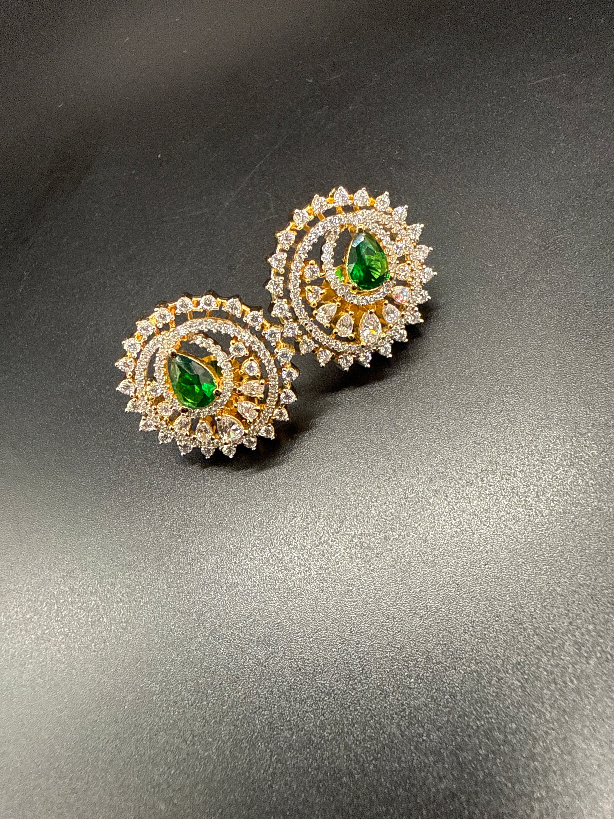 Emerald stone AD studs