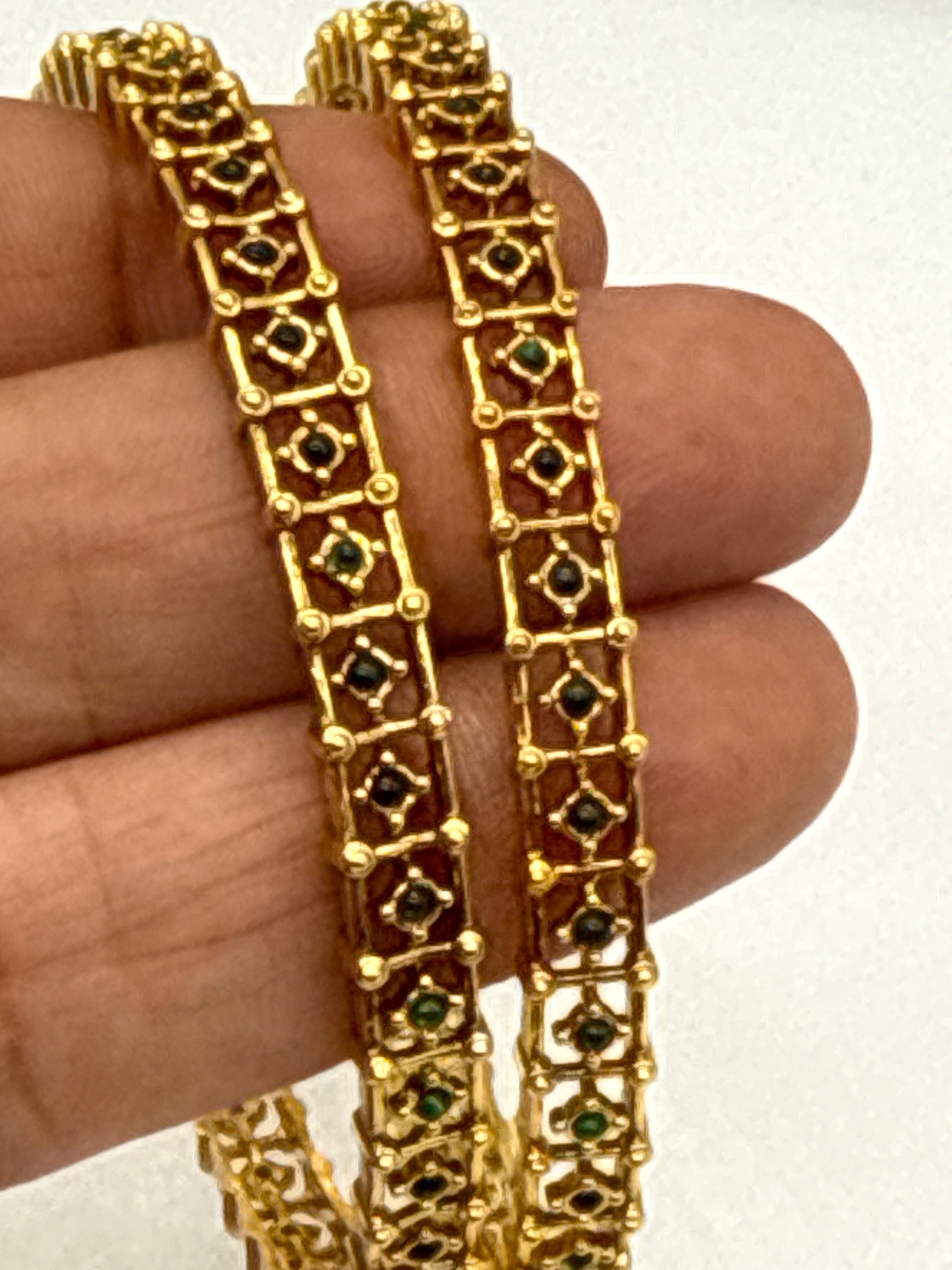 Emerald gold bangles