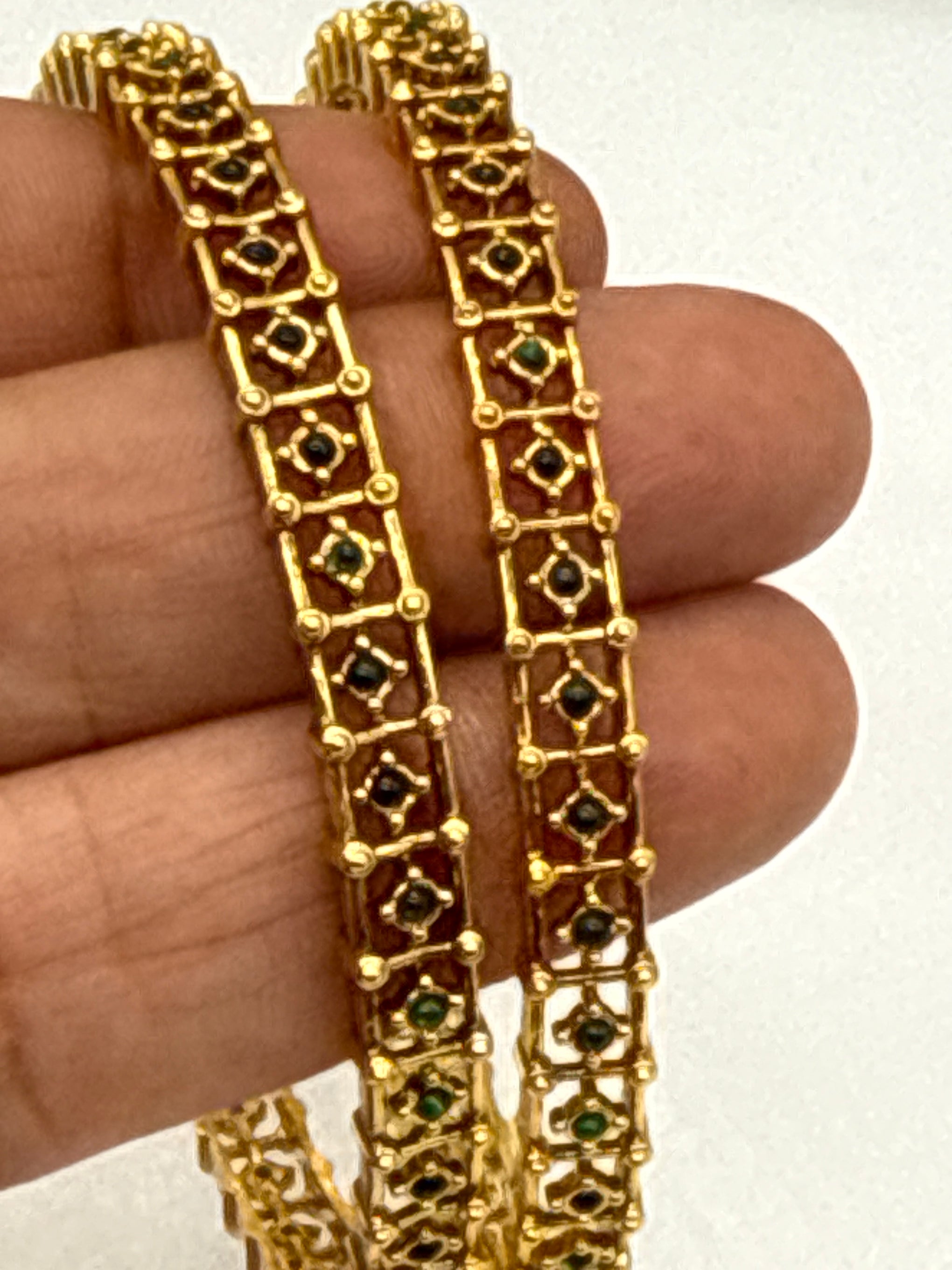 Emerald gold bangles