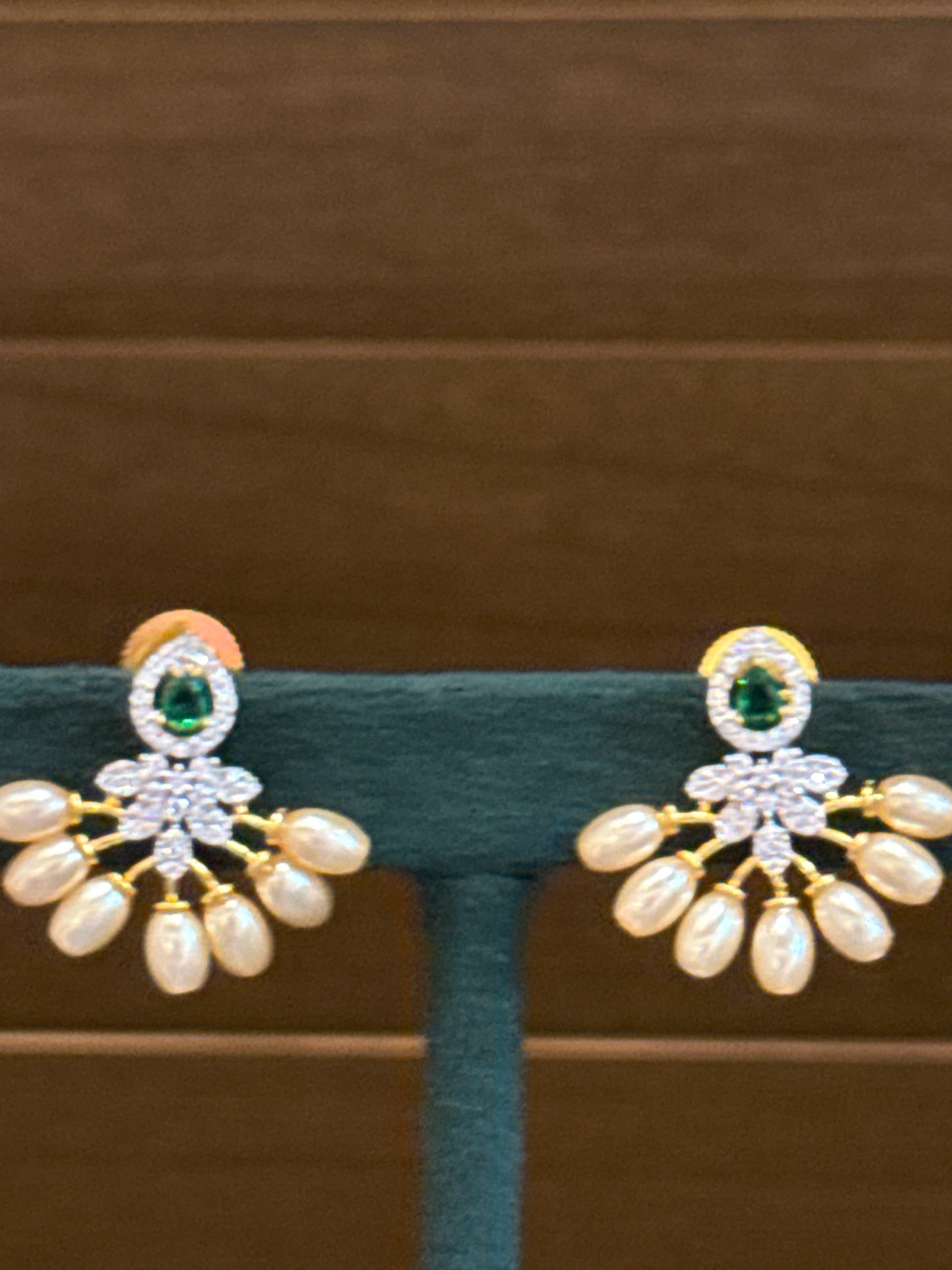 Emerald pearls studs