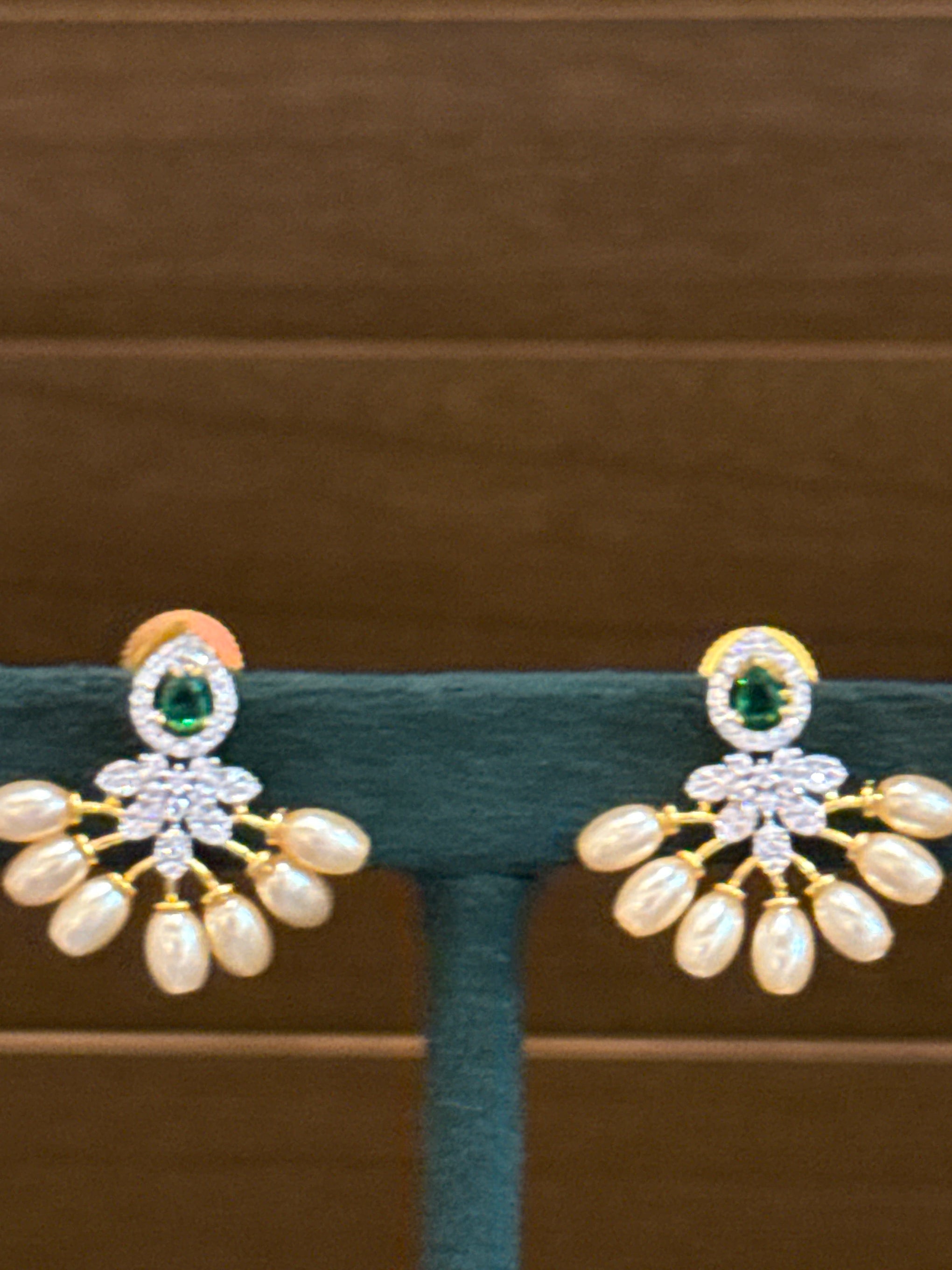 Emerald pearls studs