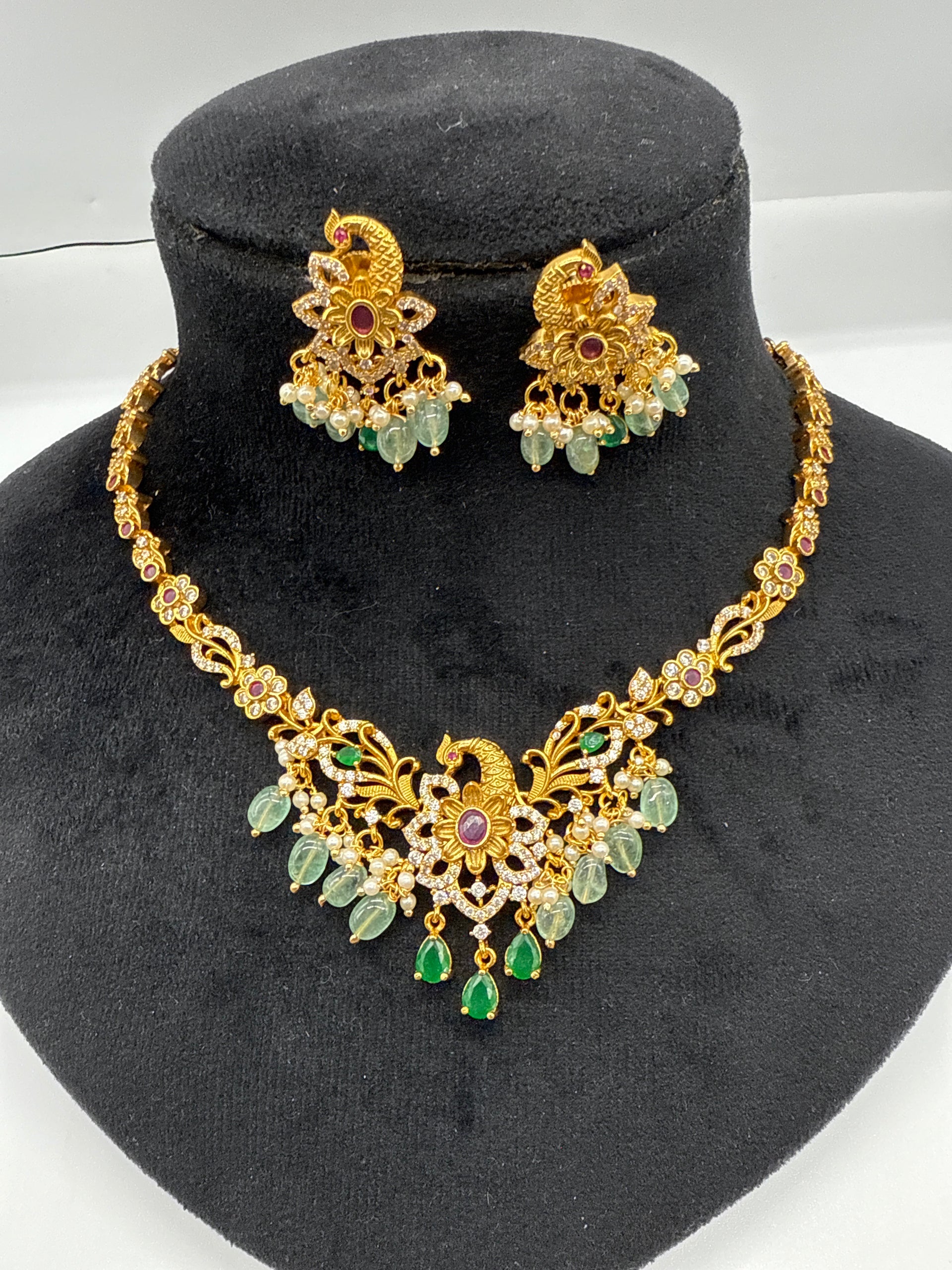 Gold set in emerald