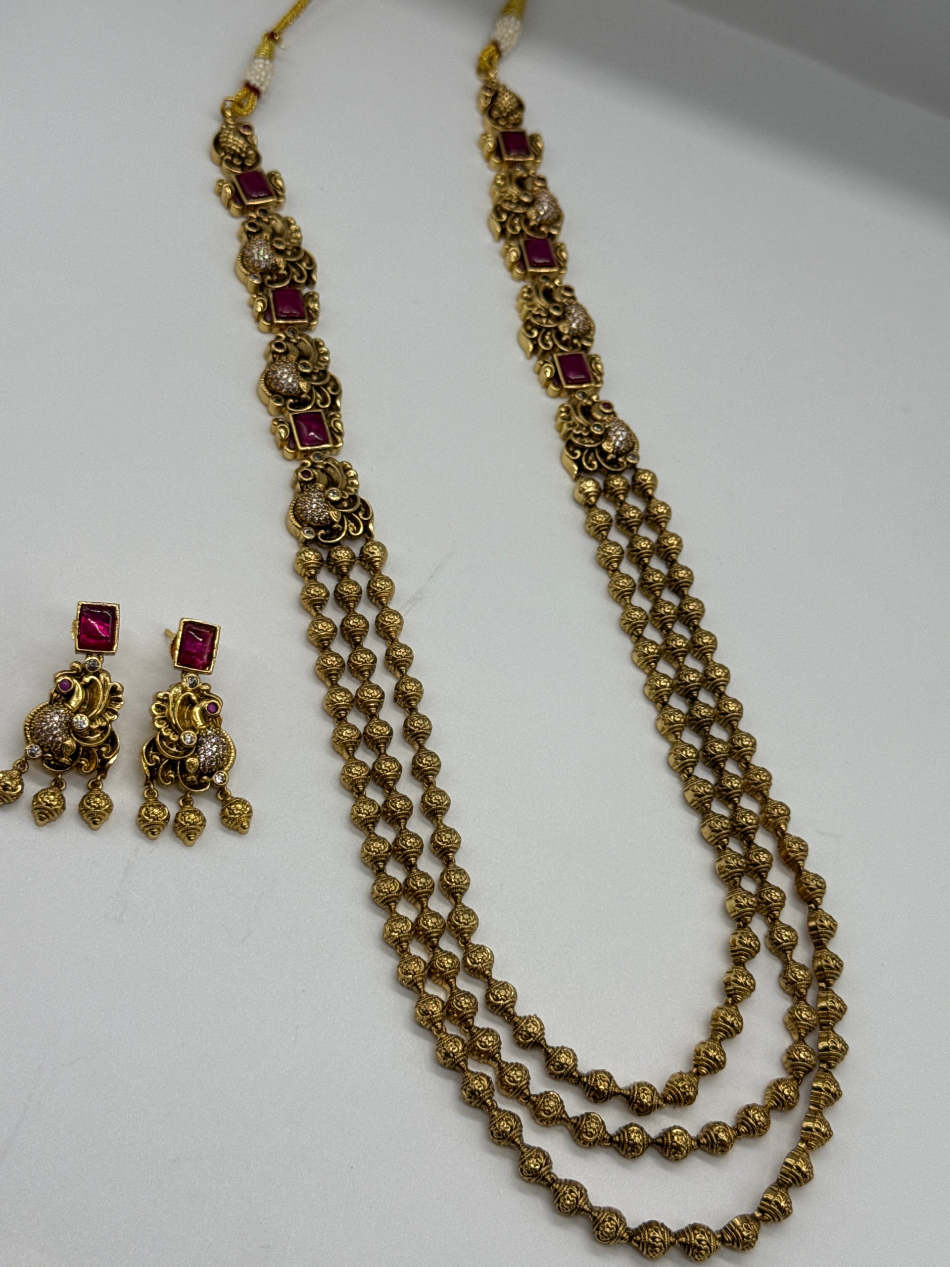 Nakshi balls set in  ruby